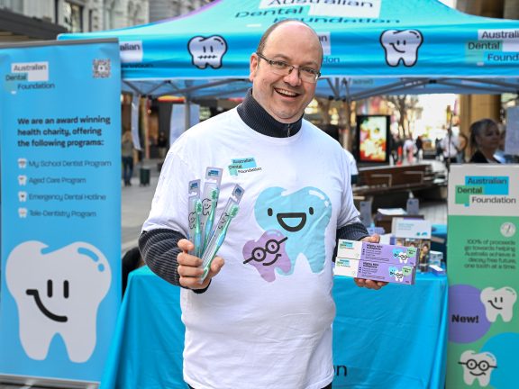 Dr Greg handing out free oral care supplies in Rundle Mall.