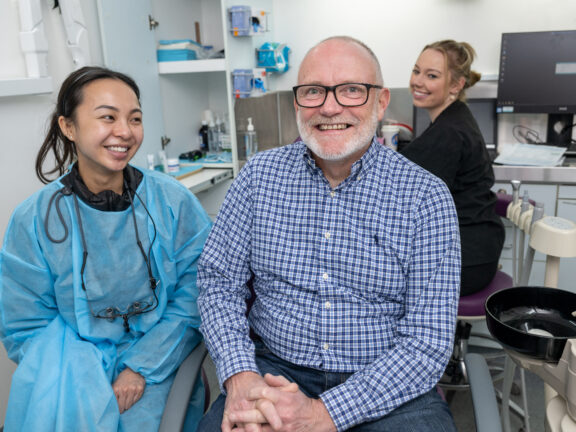 ADFi’s oral health therapist Han and dental assistant Sasha with ● Southern Mallee Mayor Ron Valentine