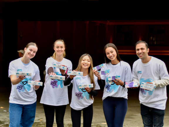 Australian Dental Foundation volunteers holding toothpaste at the Adelaide Railway Station